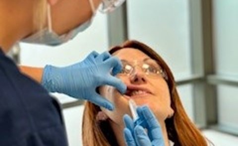 A patient receiving local anaethetic for treatment